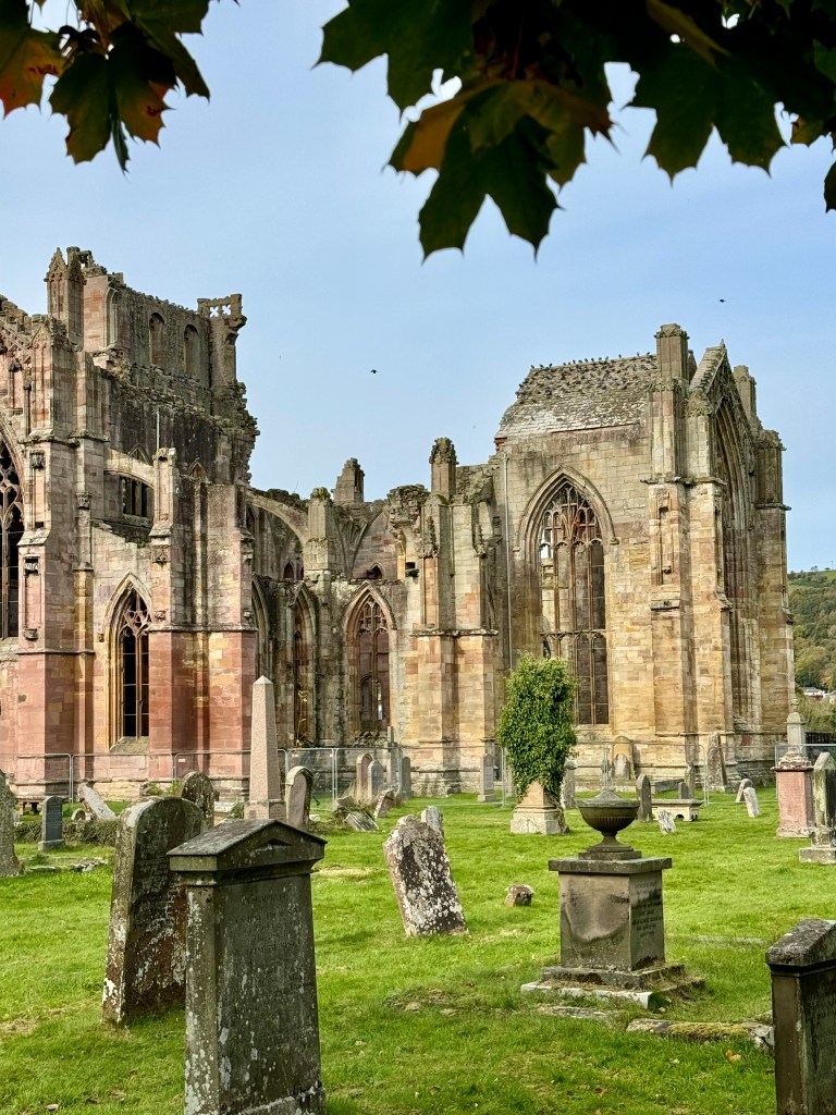 View from south, with gravestones in grounds.