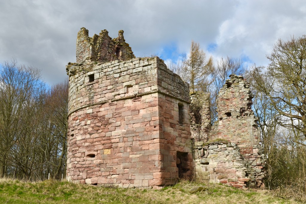 Another view taken from south of the tower., with trees behind.