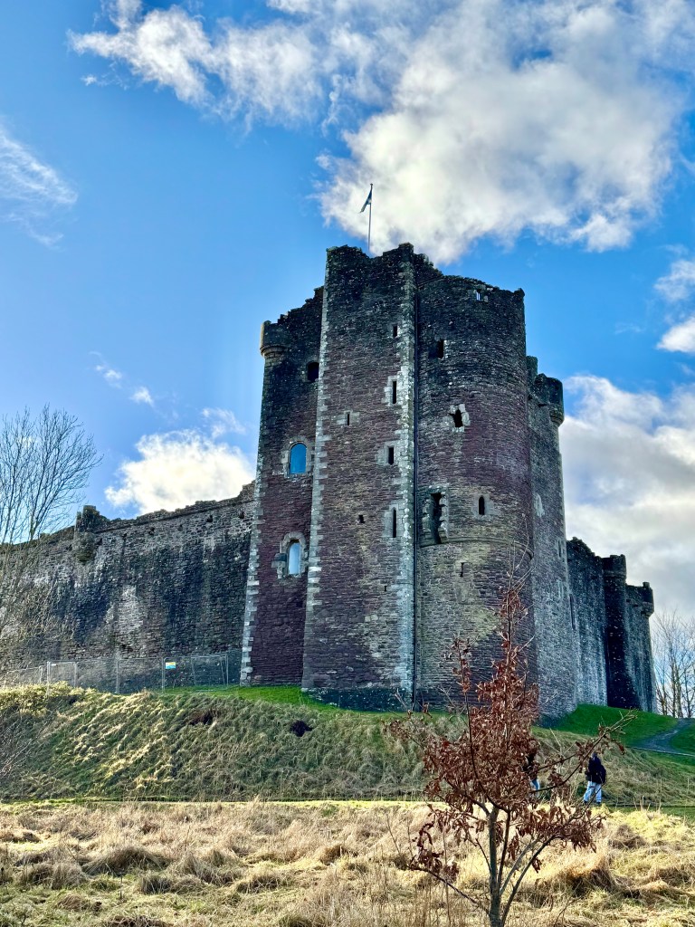 View from path below, looking at the north east side of the castle, with gatehouse tower on the right.