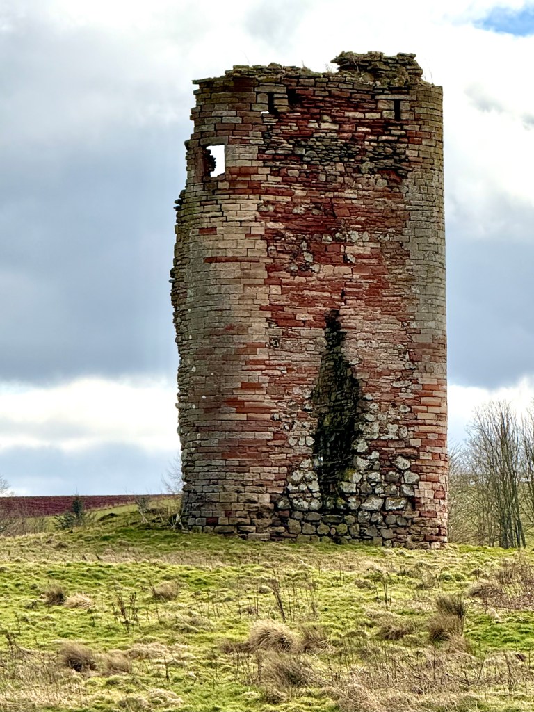 Close up of west wall, showing large narrow hole in lower  central part.
