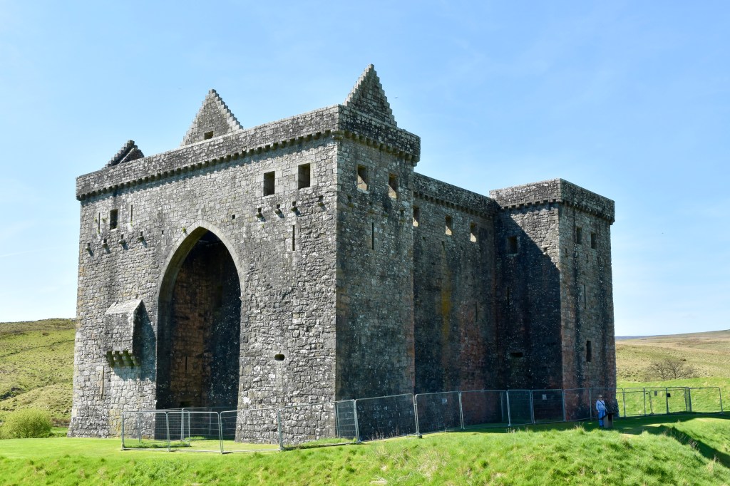 View of castle from north east. Large archway on left is very apparent. 