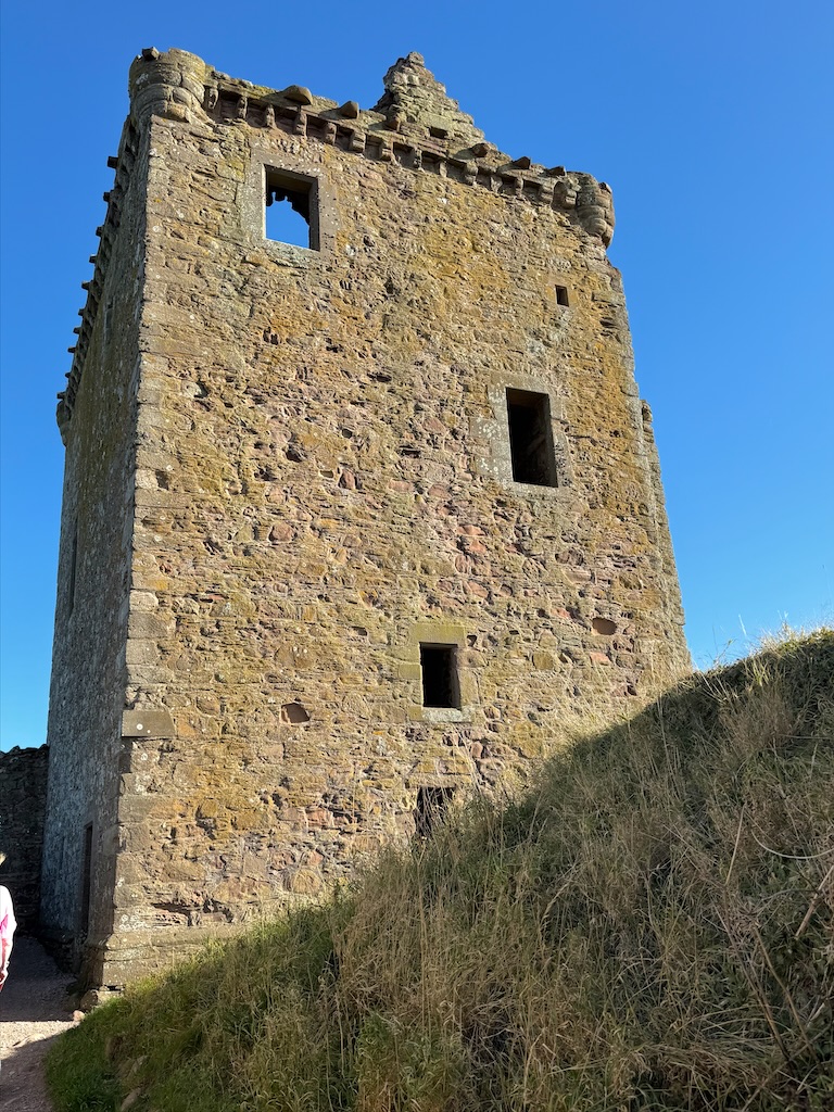 Close-up. looking upwards of the Keep. Narrowish windows, but only one per floor