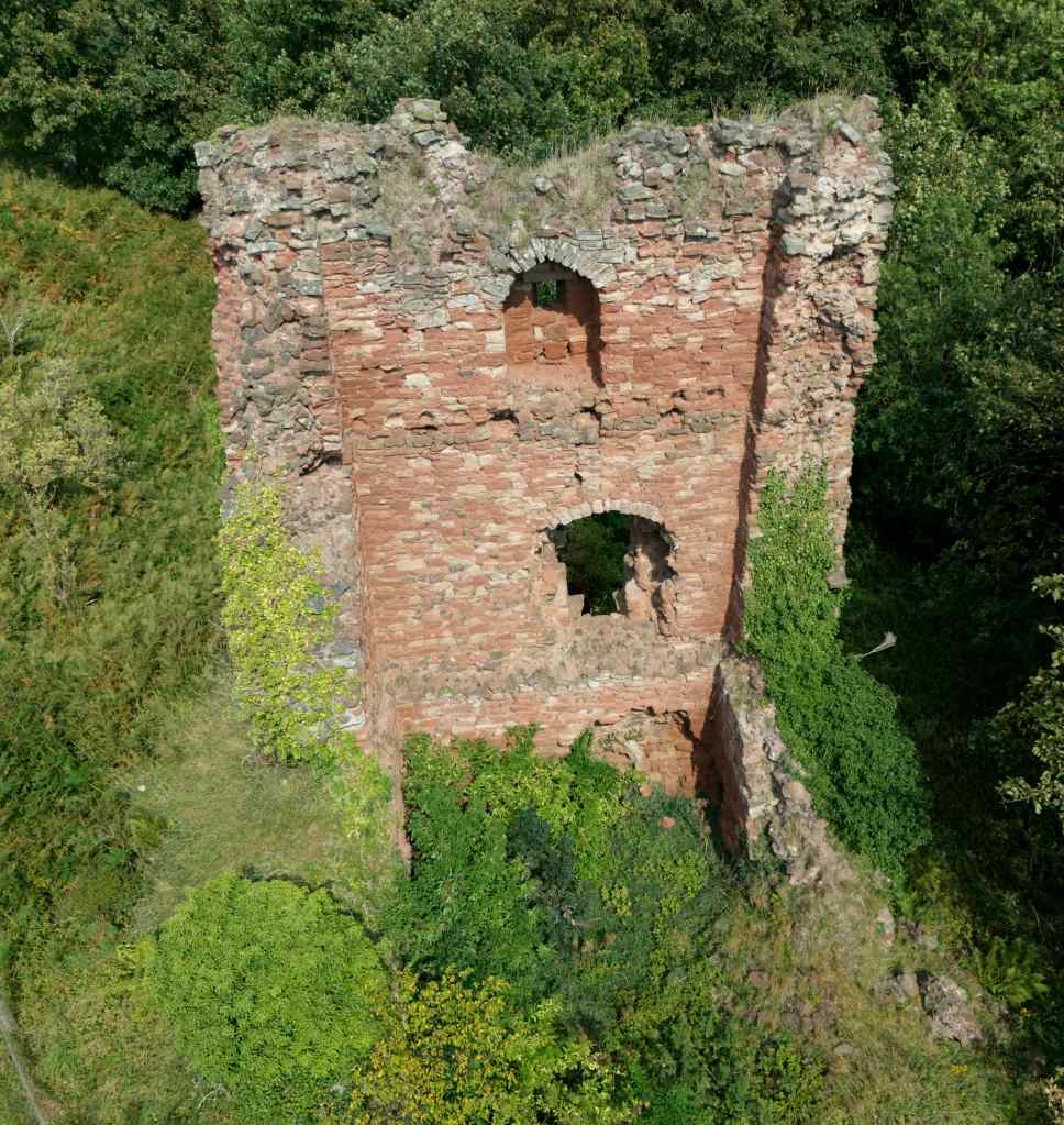 Again, showing entrance and embrasured window in floor above. 