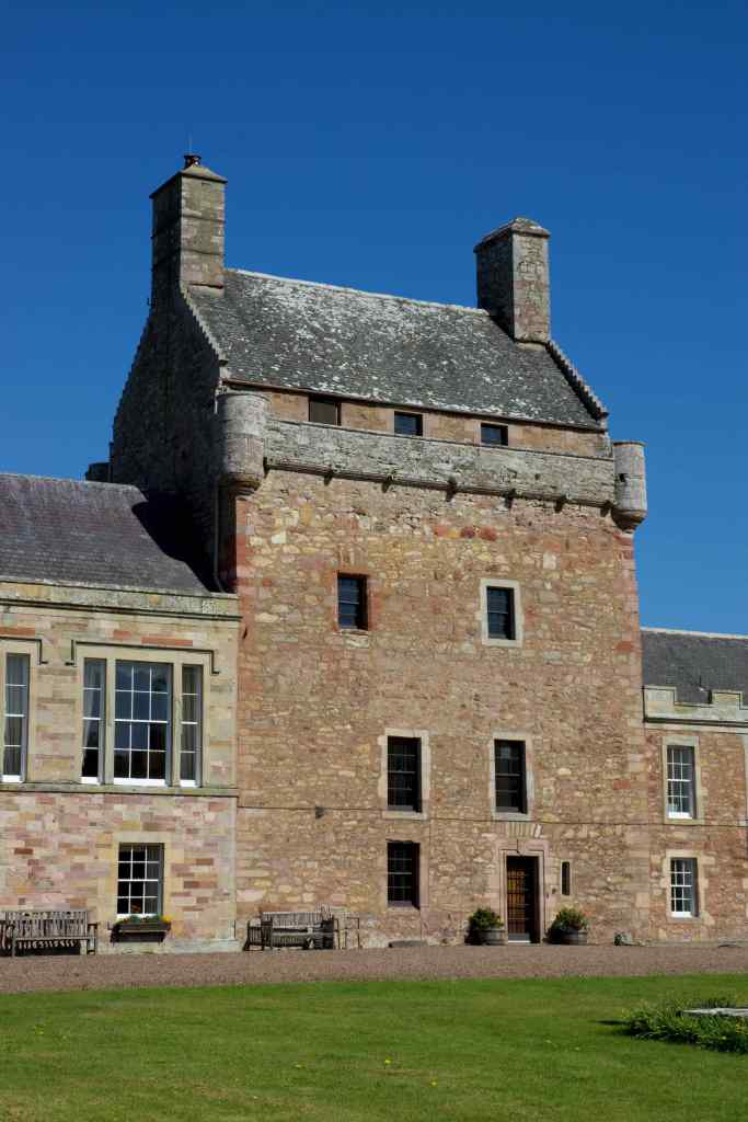 Closer view, from the south west. The turrets on the parapet are clear.